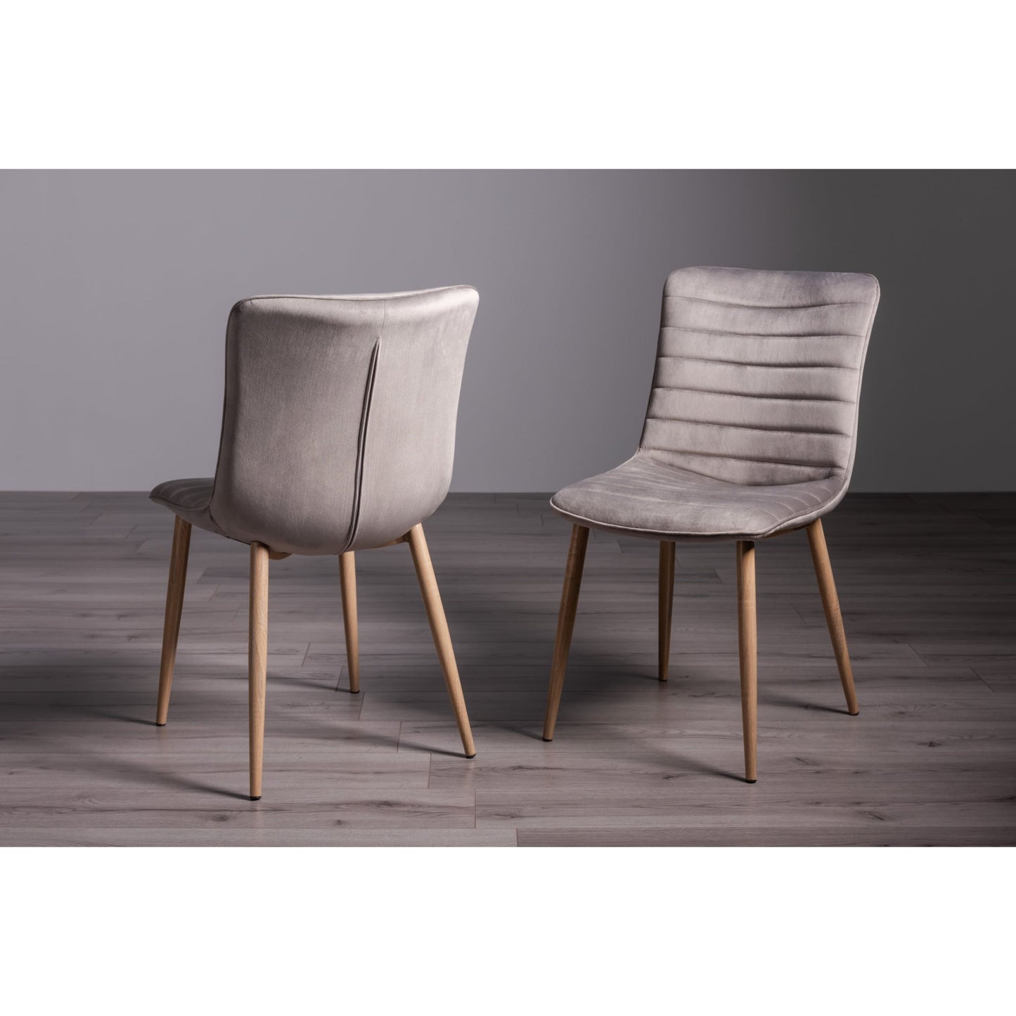 Pair of Velvet Dining Chairs with Horizontal Stitching and Oak Effect Wooden Legs in a Choice of Three Colours