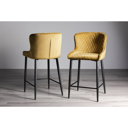 Pair of Velvet Stools with Diamond Stitched Upholstery and Sand Black Metal Legs in a Choice of Three Colours