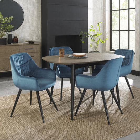 4 Seater 129cm Weathered Oak Table Set with 4 Blue Velvet Chairs Featuring Black Legs and a Pleated Pattern