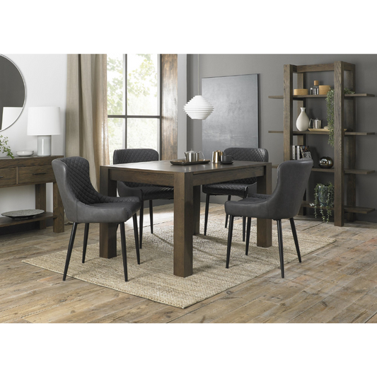 4-6 Seater Extending Dining Set: 125-165cm Table & 4 Dark Grey Faux Leather Chairs with Sand Black Legs