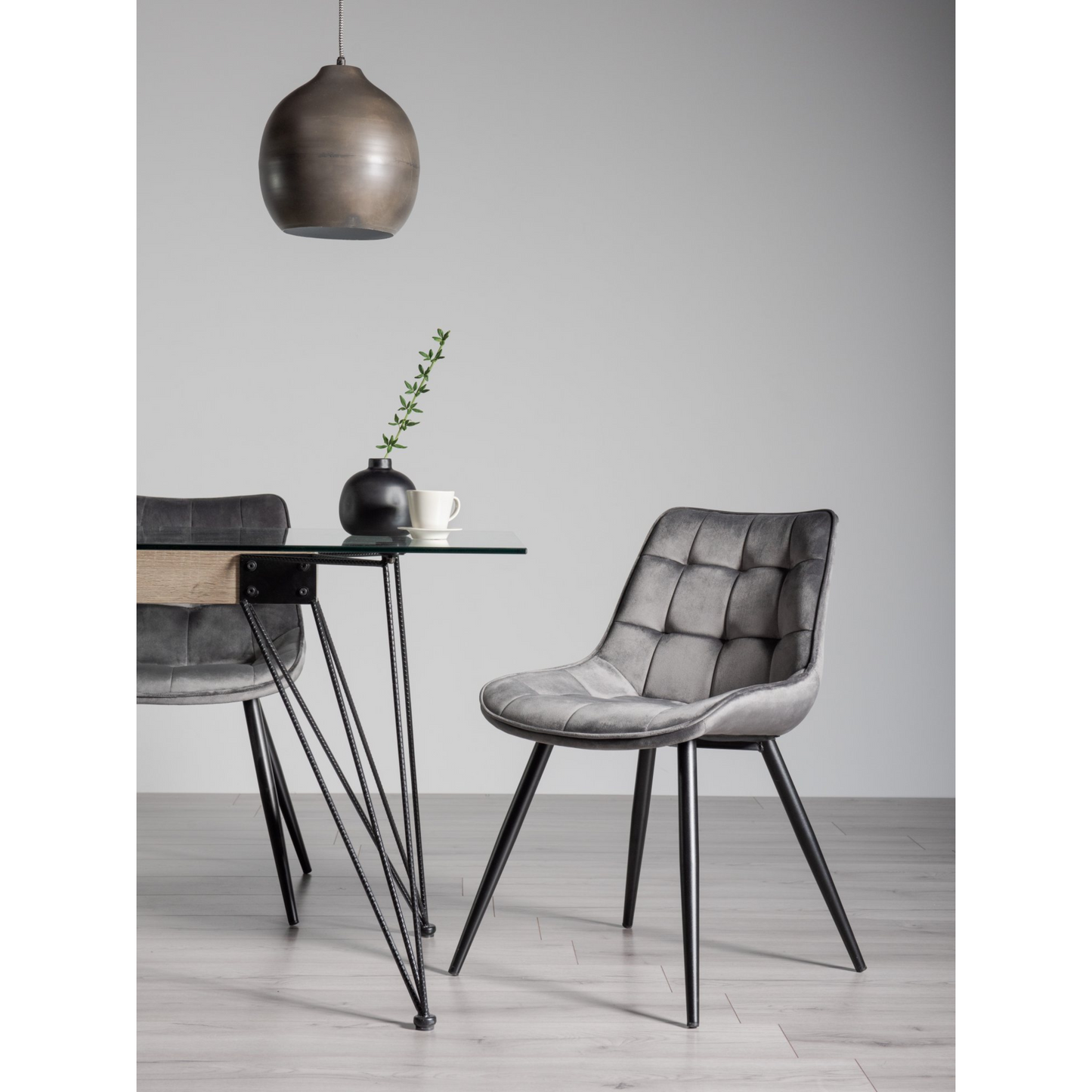 Pair of Velvet Dining Chairs with Square Stitched Upholstery, Shaped Seating, and Sand Black Metal Legs, Available in a Choice of Three Colors.