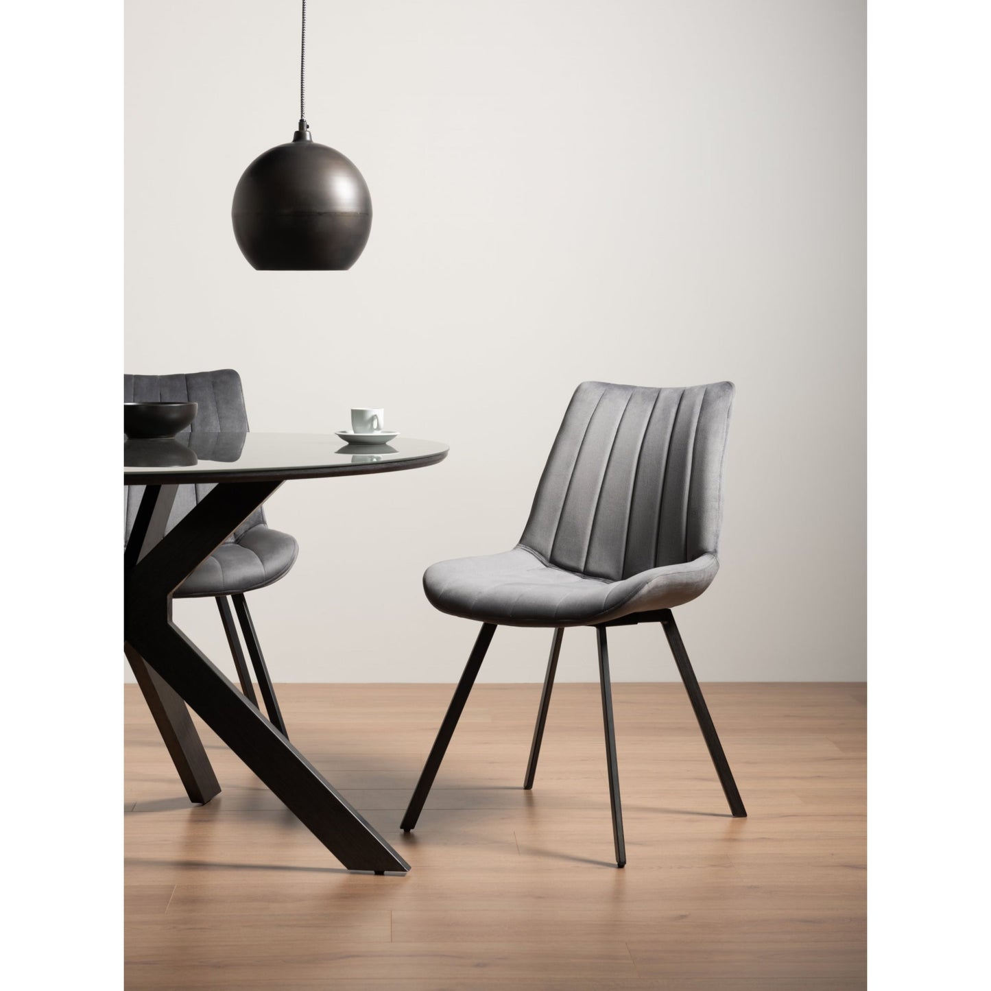 Pair of Velvet Dining Chairs with Vertical Stitching and Sand Black Metal Frame in a Choice of Three Colours