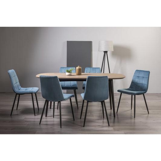 6 Seater 175cm Weathered Oak Table Set with 6 Blue Velvet Dining Chairs Featuring Black Legs and Square Stitched Upholstery