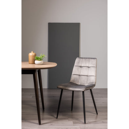 Pair of Velvet Dining Chairs with Square Stitched Upholstery and Sand Black Metal Legs in a Choice of Three Colours