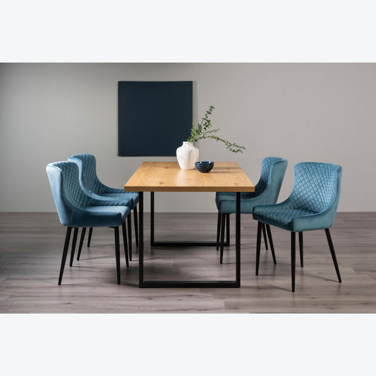 4 Seater 160cm Dining Table Featuring Rustic Oak Effect Top with U-Shaped Legs and 4 Blue Velvet Armchairs