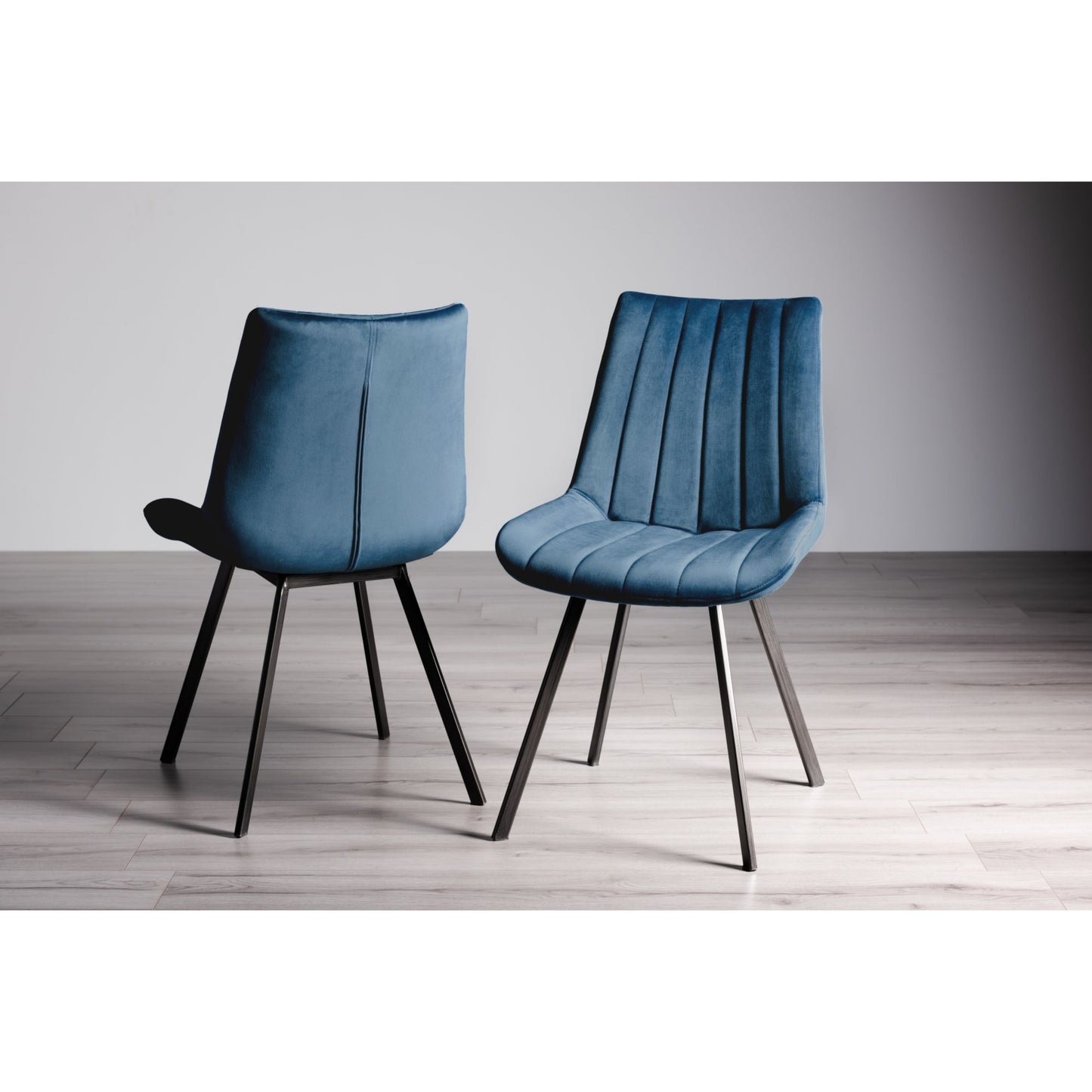 Pair of Velvet Dining Chairs with Vertical Stitching and Sand Black Metal Frame in a Choice of Three Colours