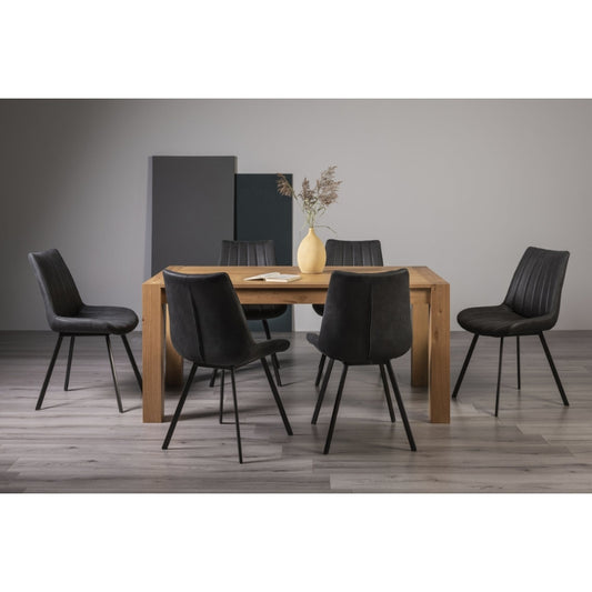 6-8 Seater 165-225cm Extending Light Oak Dining Table with 6 Dark Grey Faux Suede Dining Chairs Featuring Black Legs and Striped Stitching