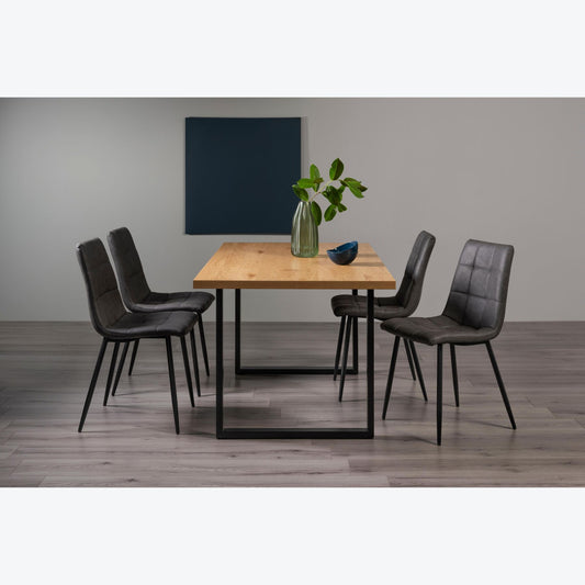 4 Seater 160cm Dining Table Featuring Rustic Oak Effect Top with U-Shaped Legs and 4 Dark Grey Faux Leather Dining Chairs